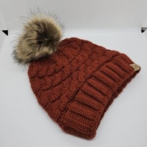 David & Young rust red knit beanie with faux fur pom